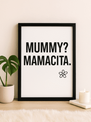 Playful Print and Cozy Decor Framed minimalist “MUMMY? MAMACITA.” black text art print on white background, styled on feminine vanity with daisy accent.