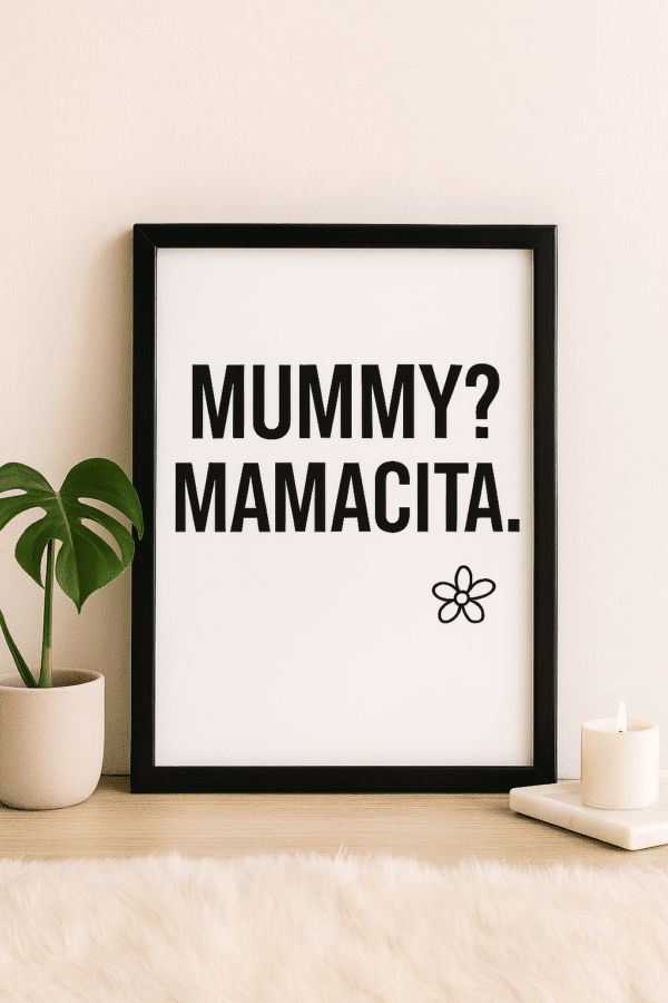 Playful Print and Cozy Decor Framed minimalist “MUMMY? MAMACITA.” black text art print on white background, styled on feminine vanity with daisy accent.
