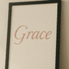 Graceful Script on Soft Textured Paper ‘Grace Whispers’ is a modern printable wall art design that brings softness and clarity to any room. Featuring the word “Grace” in rose-blush calligraphy against a textured ivory background, this piece is designed to feel both intentional and timeless.
