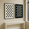 Polka Dots and Natural Light Framed minimalist polka dot wall art set in black and white, displayed in a modern interior
