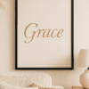 Serene Living Room Art Display ‘Grace Whispers’ is a modern printable wall art design that brings softness and clarity to any room. Featuring the word “Grace” in rose-blush calligraphy against a textured ivory background, this piece is designed to feel both intentional and timeless.
